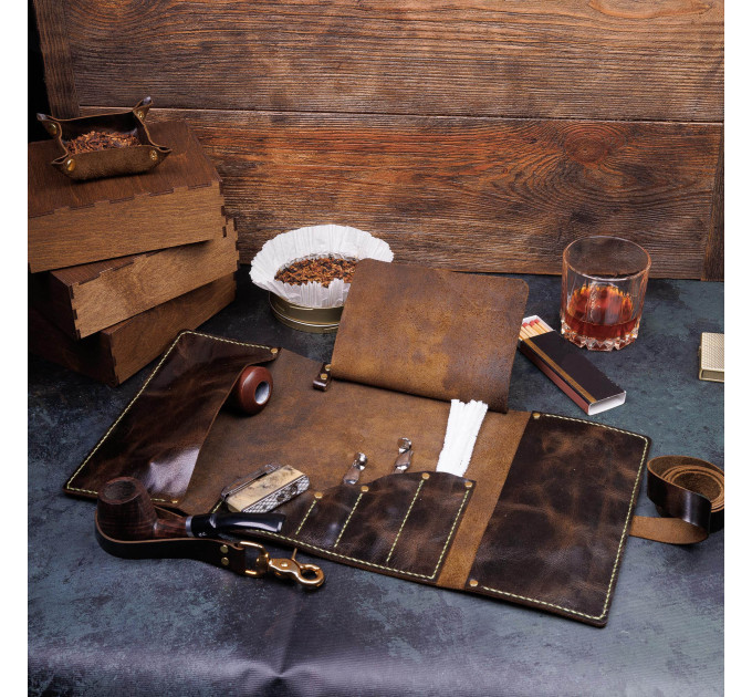  Crafted with meticulous attention to detail, this pipe bag is not just an accessory; it's an essential companion for connoisseurs of fine tobacco and elegant pipes