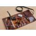 In a leather pipe roll you can fit specific kit such as a smoking pipe, tobacco accessories, or several cigars.