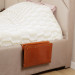 With multiple pockets and compartments, this under the mattress caddy is perfect for storing your books, tablets, glasses, remotes, and more – keeping them organized and easily accessible throughout the night