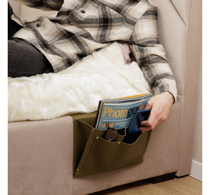 Made from premium leather, it exudes sophistication while offering durable storage for items such as remotes, phones, books, and more, ensuring that everything you need for a restful night's sleep is right at your fingertips.