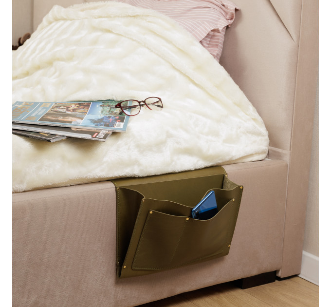 Made from premium leather, it exudes sophistication while offering durable storage for items such as remotes, phones, books, and more, ensuring that everything you need for a restful night's sleep is right at your fingertips.