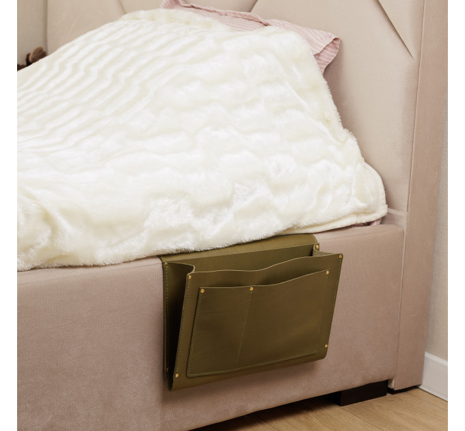Made from premium leather, it exudes sophistication while offering durable storage for items such as remotes, phones, books, and more, ensuring that everything you need for a restful night's sleep is right at your fingertips.