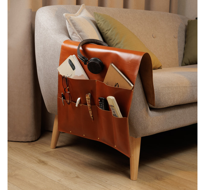 Tired of searching your remotes or struggling to find a spot for your phone or tablet while lounging on your couch? Keep your living space tidy and your essentials within arm's reach with our leather couch organizer – perfect blend of style and function f