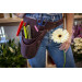 It is worn on the hip, which allows youeasily pull your favorite tool without bending your arm.
