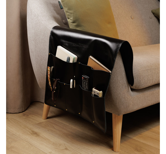 Elevate your living room organization with our stylish & functional couch armrest caddy. Crafted with convenience and elegance in mind, this leather organizer seamlessly integrates into your living space, offering a stylish solution to keep all your e