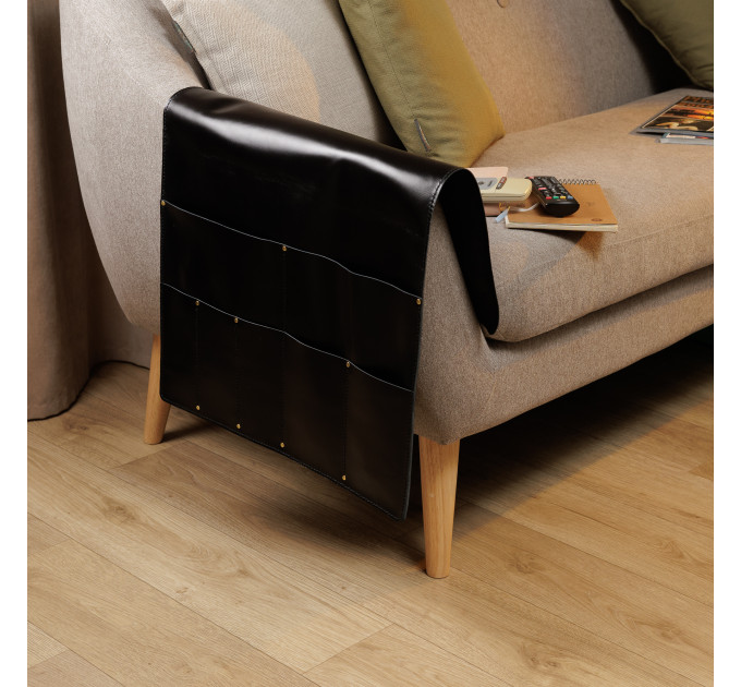 Elevate your living room organization with our stylish & functional couch armrest caddy. Crafted with convenience and elegance in mind, this leather organizer seamlessly integrates into your living space, offering a stylish solution to keep all your e