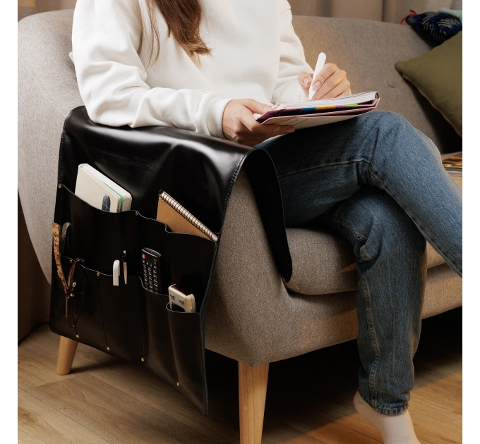 Elevate your living room organization with our stylish & functional couch armrest caddy. Crafted with convenience and elegance in mind, this leather organizer seamlessly integrates into your living space, offering a stylish solution to keep all your e