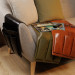 Elevate your living room organization with our leather arm chair caddy! Designed with meticulous attention to detail, our leather couch organizer serves for multiple storage solutions from housing your TV remotes to neatly storing magazines, tablets, and 
