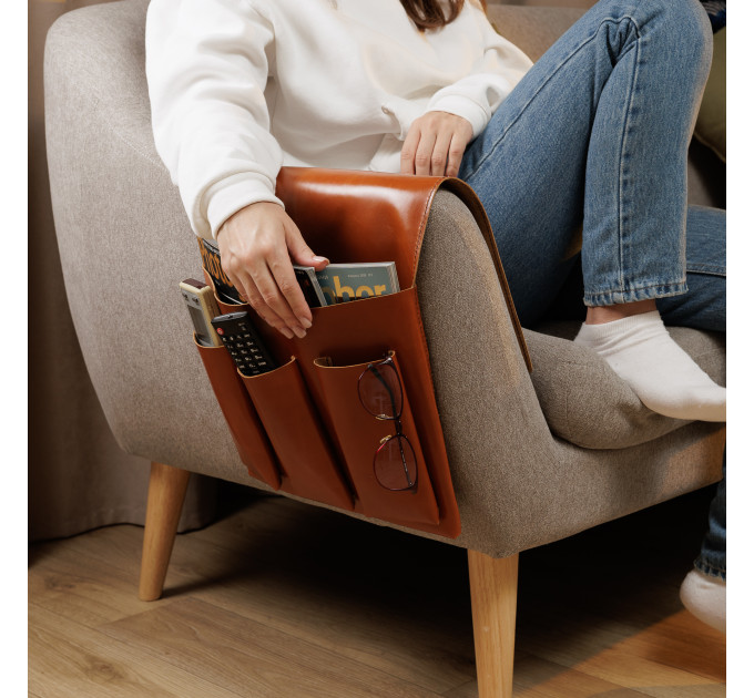 Elevate your living room organization with our leather arm chair caddy! Designed with meticulous attention to detail, our leather couch organizer serves for multiple storage solutions from housing your TV remotes to neatly storing magazines, tablets, and 