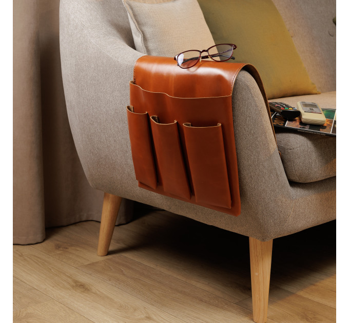 Elevate your living room organization with our leather arm chair caddy! Designed with meticulous attention to detail, our leather couch organizer serves for multiple storage solutions from housing your TV remotes to neatly storing magazines, tablets, and 